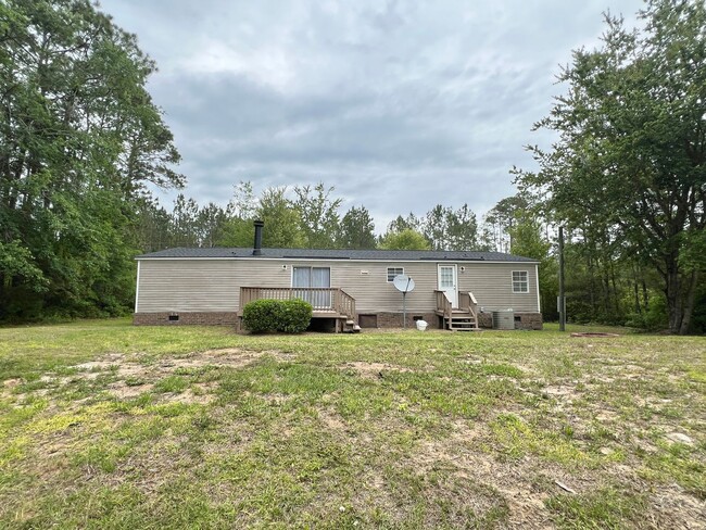 Building Photo - AVAILABLE NOW | PETS PERMITTED OUTDOORS ON...