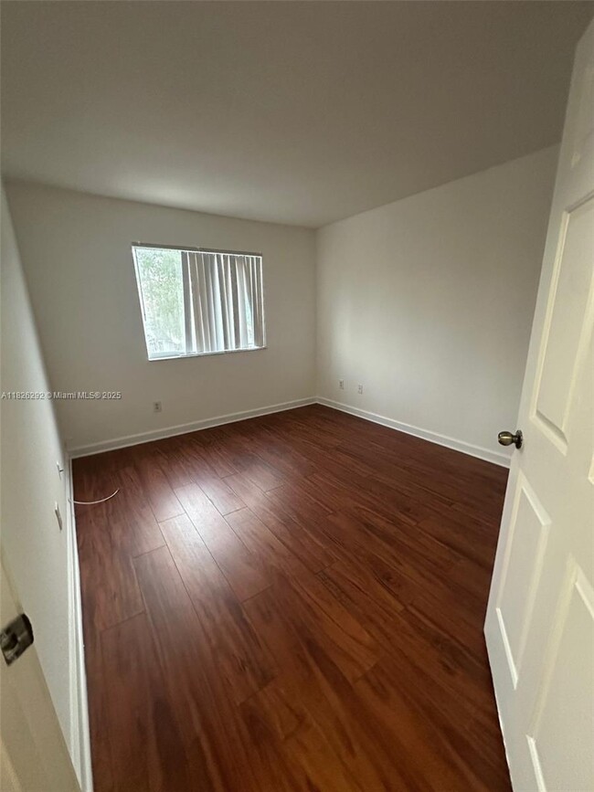 Building Photo - 7375 NW 173rd Dr