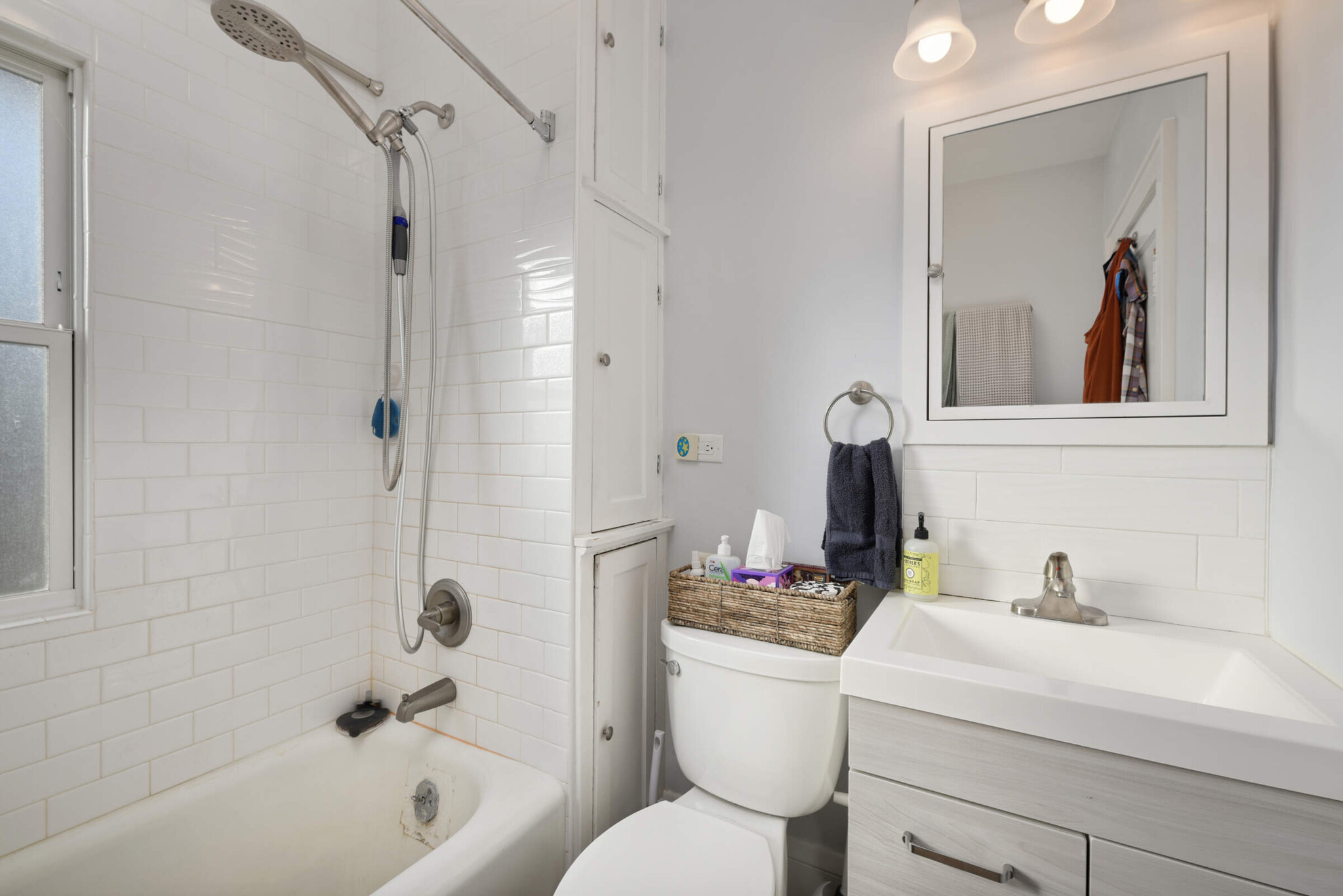 Remodeled bathroom with new shower, vanity, sink, toilet and tile surrounds - 616 37th Ave NE