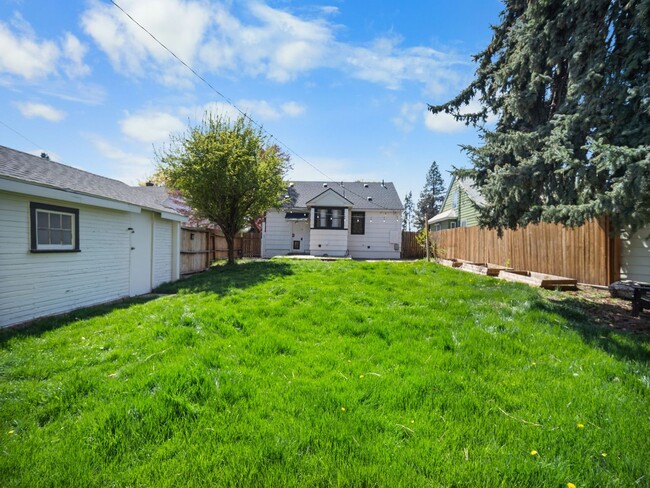Building Photo - Spacious 4-Bedroom Home w/large Outdoor Sp...