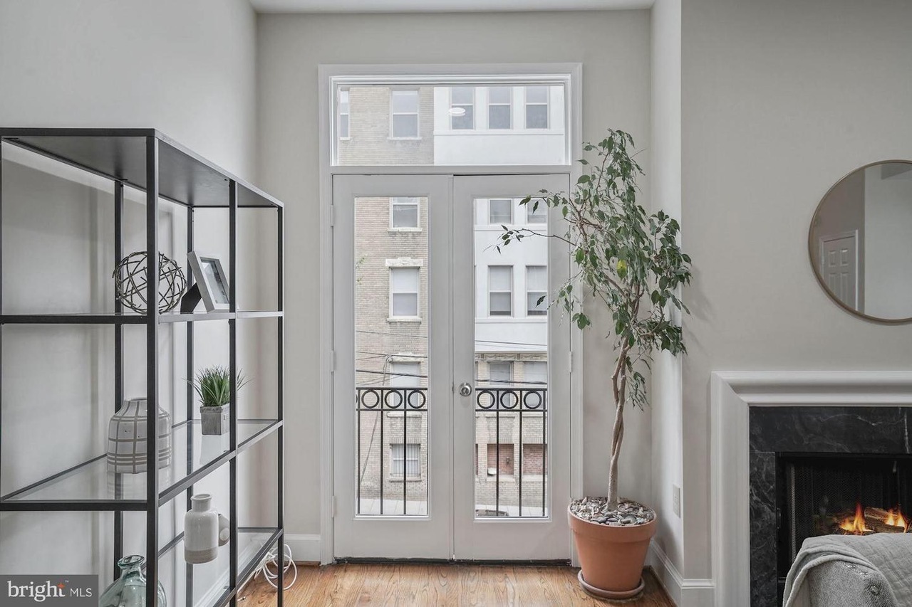 French Windows Flanking the Wood Burning Fireplace - 1849 Kalorama Rd NW