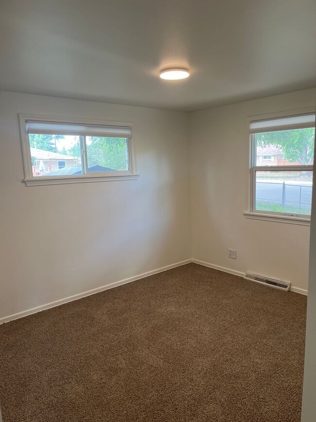 Building Photo - New Finishes in this Home on a Large Lot with Covered Parking and AIR CONDITIONING! MOVE IN READY!