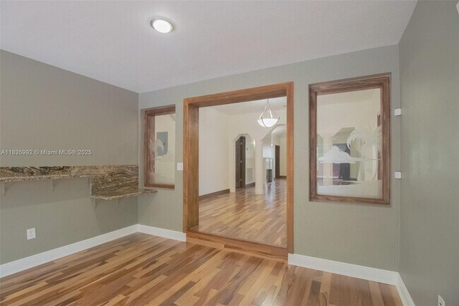 Building Photo - 3722 Royal Palm Ave