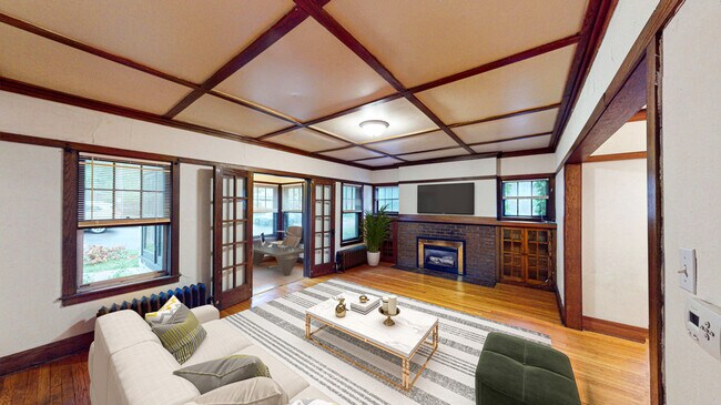 Living Room Staged - The Badger Den Apartments on Kendall