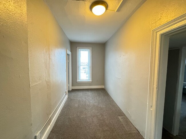 Building Photo - Two Bedroom Upper Unit on SW Side!