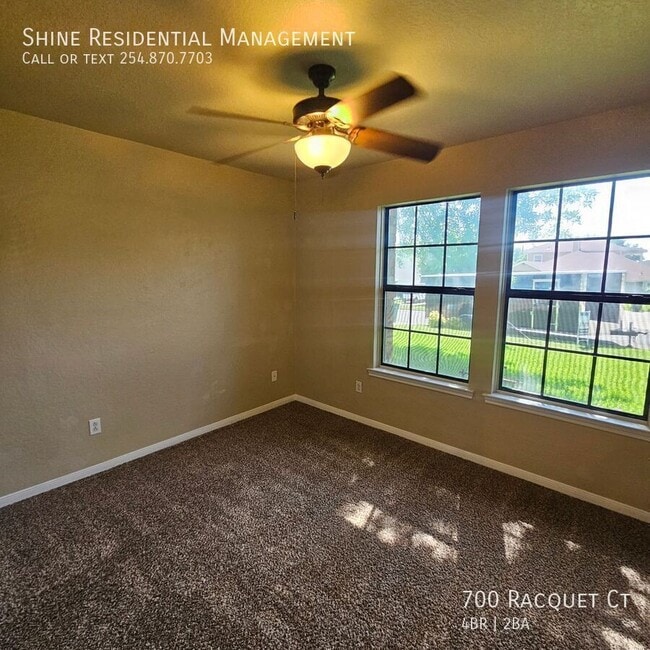 Building Photo - 700 Racquet Ct