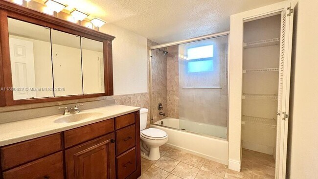 Building Photo - 303 Gardens Dr