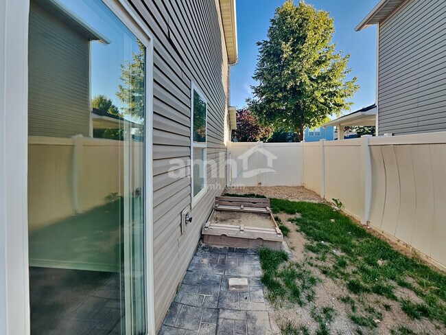 Building Photo - 9220 W Hearthside Dr