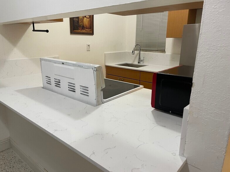 Kitchen view from living room 2 - 665 NE 83rd Ter