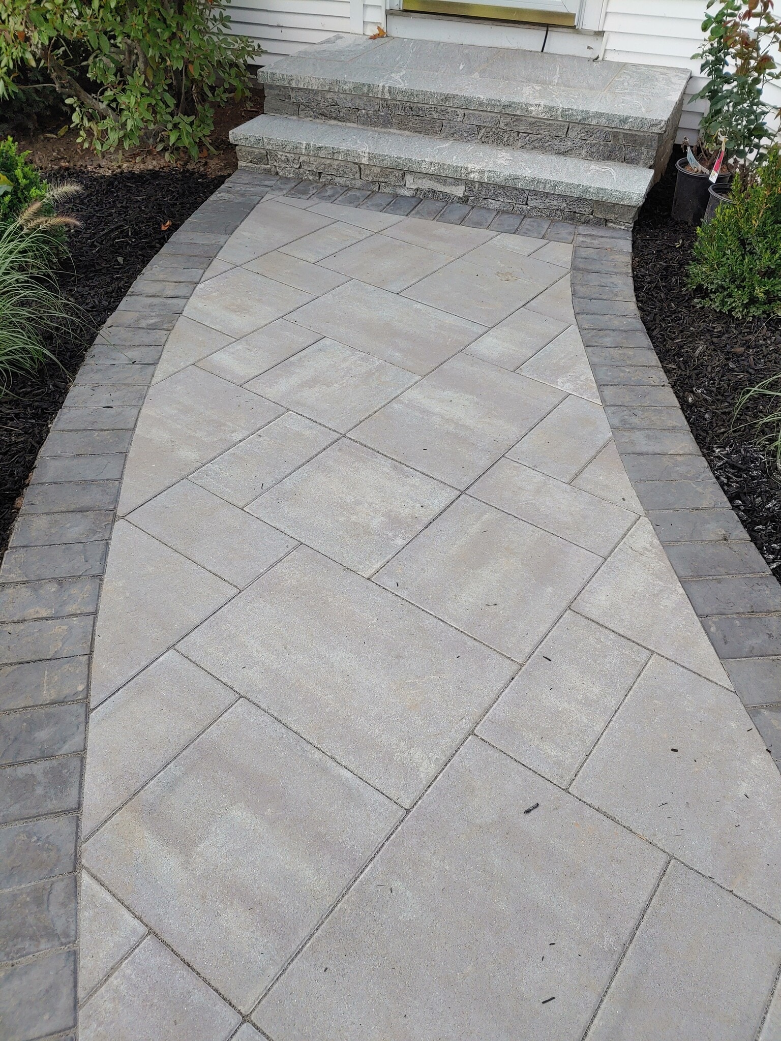 new paver walkway to front door - 623 Old West Central St