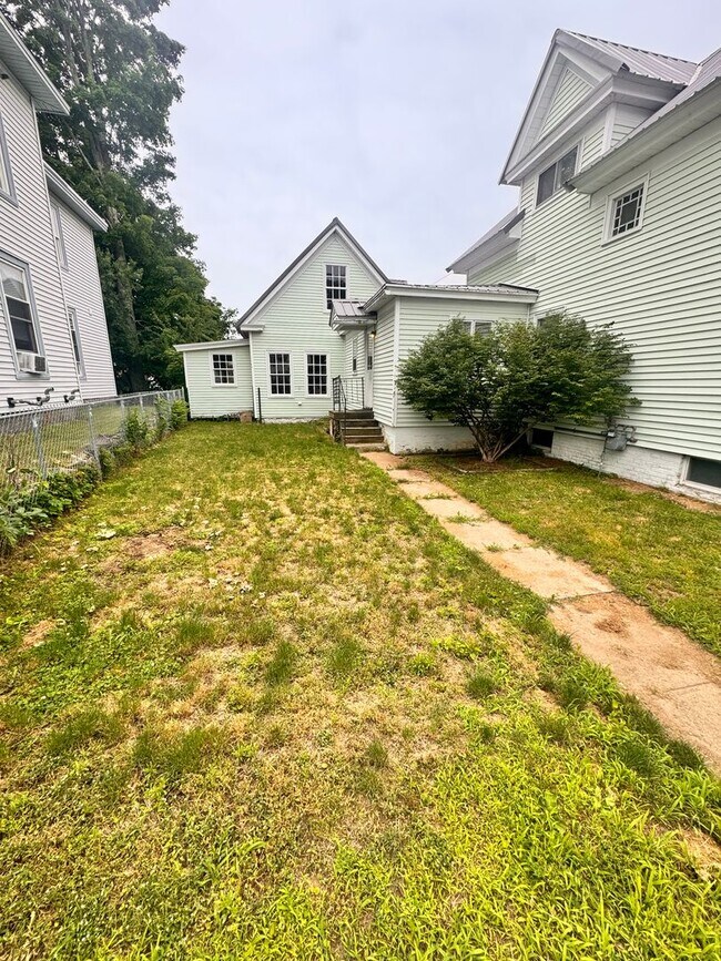 Building Photo - Spacious 4-Bedroom Home with Garage, Fenced Yard & Historic Character | Rochester, NH