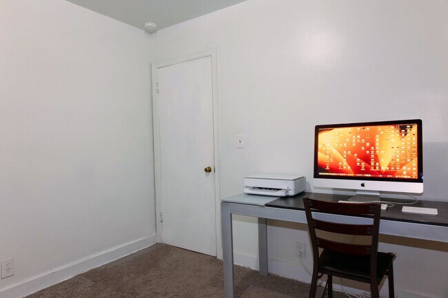 Building Photo - Charming home with a finished basement and...
