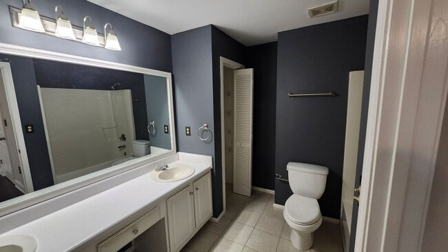 Building Photo - Top-Floor 2-Bed, 2-Bath Condo with Fireplace & Deck in Desirable Brookhaven Location!!