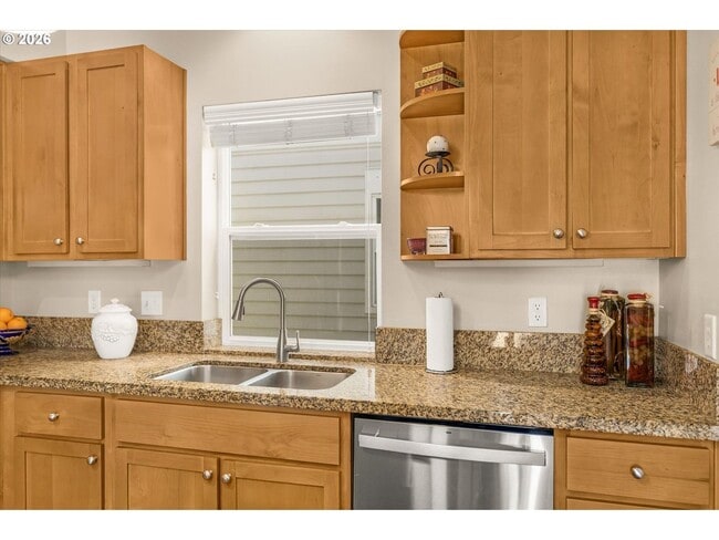 Building Photo - Main Street Living with Granite Kitchen, Gas Fireplace, and MAX Line Access