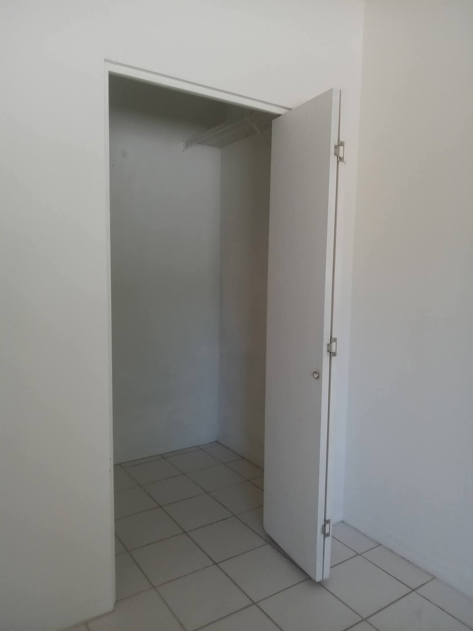 Master bedroom walk-in closet - 7088 N Moonsong Ter
