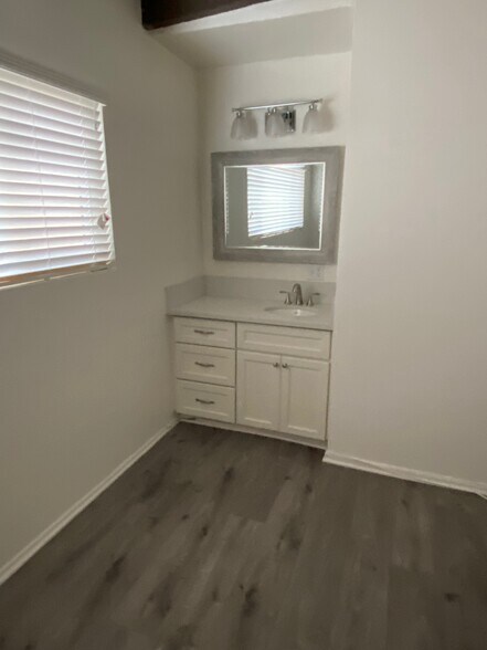 vanity in bedroom - 218 N Juanita Ave