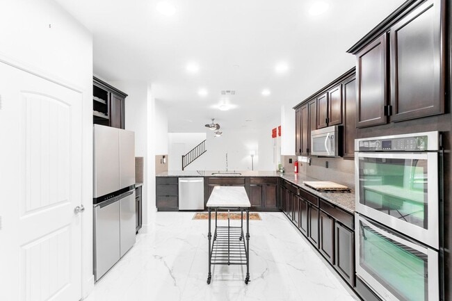 Building Photo - Immaculate 4 bedroom, 2 and 1 3/4 bath home located in the exclusive Master Planned Community Ins...