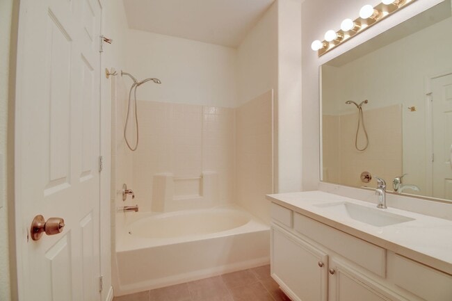 Building Photo - Gated, beautiful, and safe in a secure community