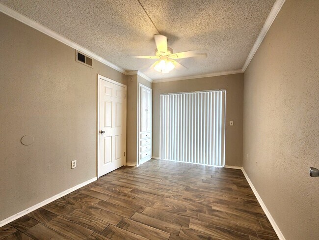 Building Photo - Ground Floor End-Unit; New Paint; All-Tile...