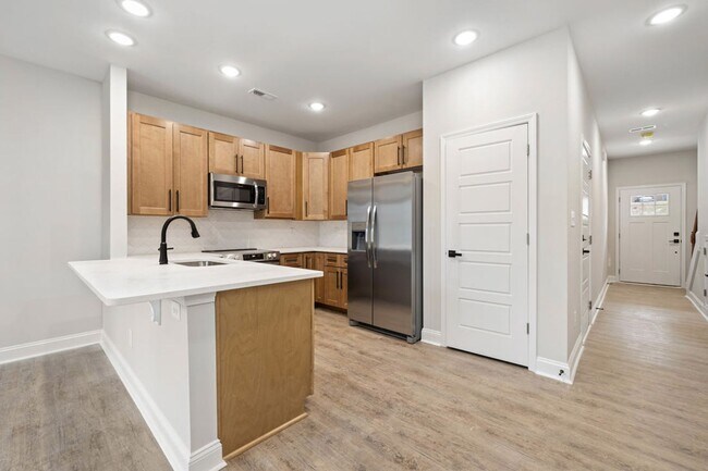 Building Photo - Luxury New 3BR Townhomes | Garage + Pool | 7 min to Fort Bragg