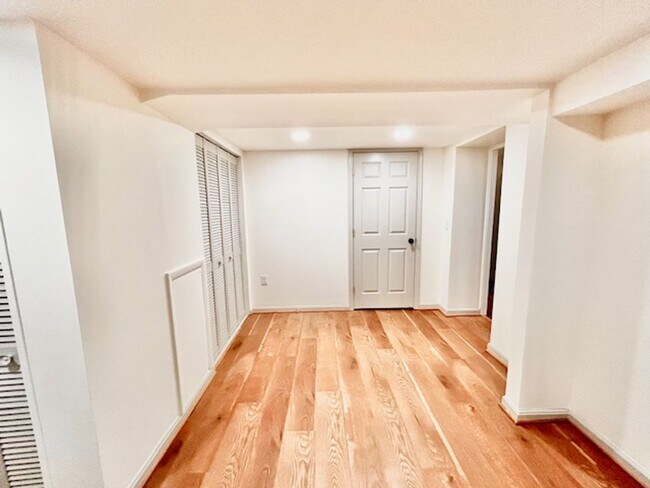 Building Photo - Beautifully renovated 4BR/3BA rambler with wraparound porch and garage