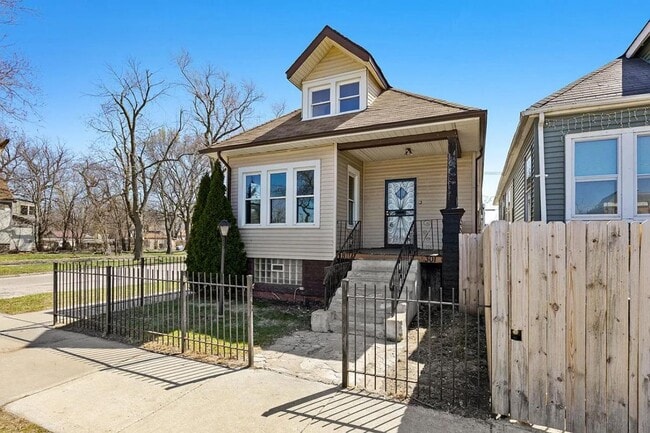 Building Photo - 1301 W 71st Pl