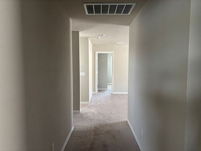 Building Photo - Like-New 4 Bedroom 3 Bath with Pond View & Two Living Spaces — Minutes to South Lake Nona