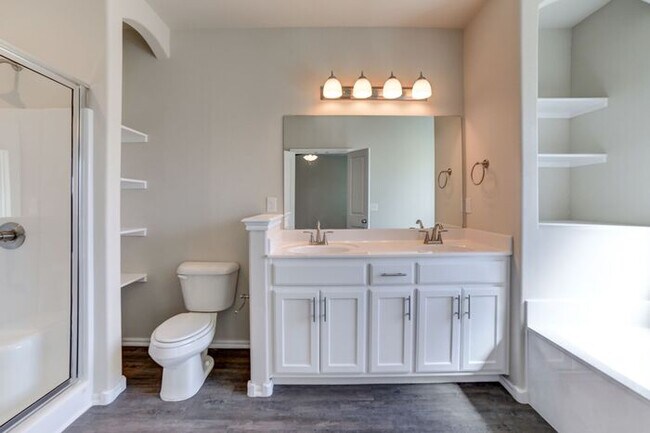 Building Photo - 3/2/2 Patio Home! Lawncare included plus a...