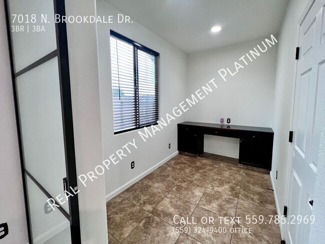 Building Photo - 7018 N Brookdale Dr