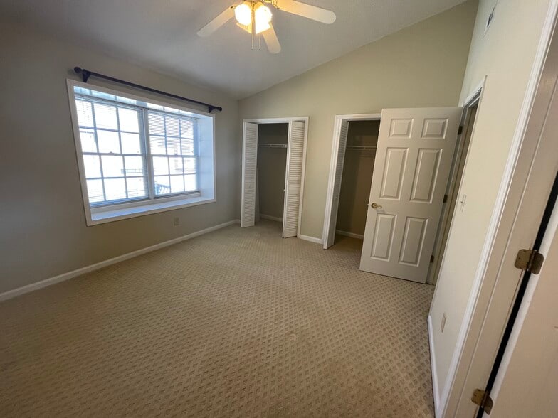 Master bedroom features huge closet space and vaulted ceilings - 830 44th Ave N