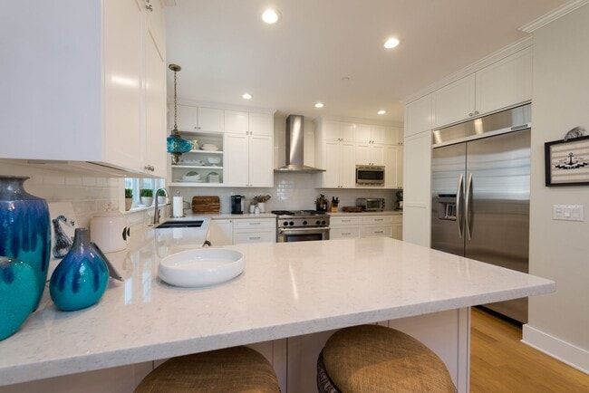 Building Photo - Four-bedroom home in the heart of the Village, offered furnished long-term lease. Ideally located...