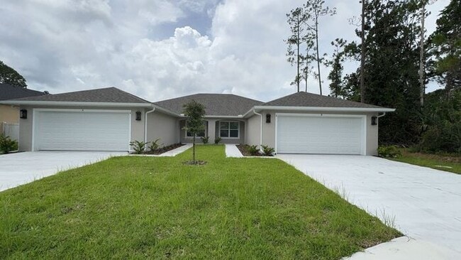 Building Photo - new 4BR duplex