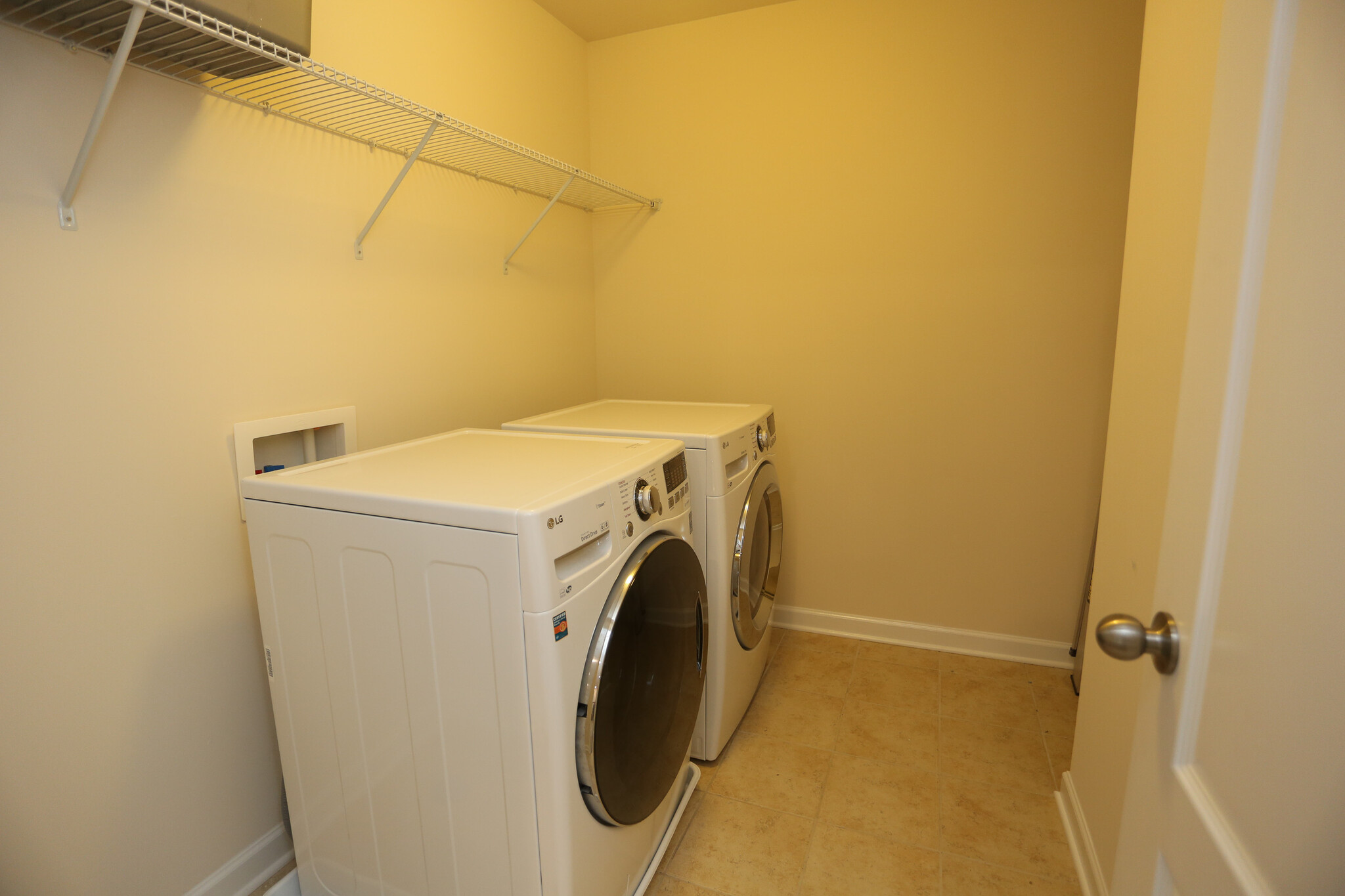 Laundry room upstairs (Washer and Dryer available for extra fee) - 2001 Trading Path Lane