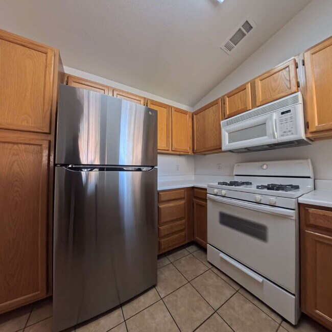 Building Photo - Upgraded 1 Bed 1 Bath Second-Story Condo at Opulence!