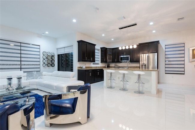 Building Photo - 9735 W 34th Ct