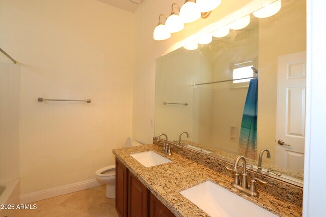 Building Photo - 10412 E Los Lagos Vista Ave