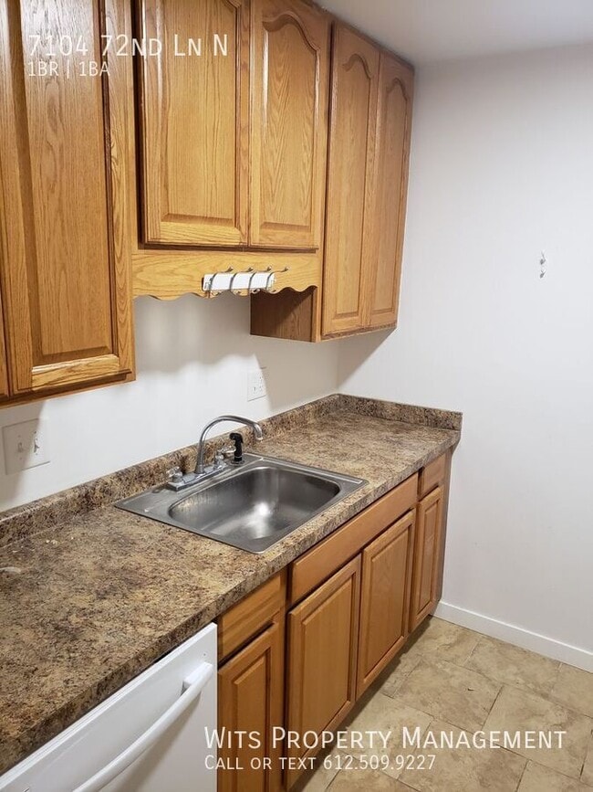 Building Photo - 7104 72nd Ln N