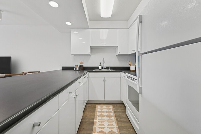 Modern kitchens with hard surface flooring - AVA Pasadena
