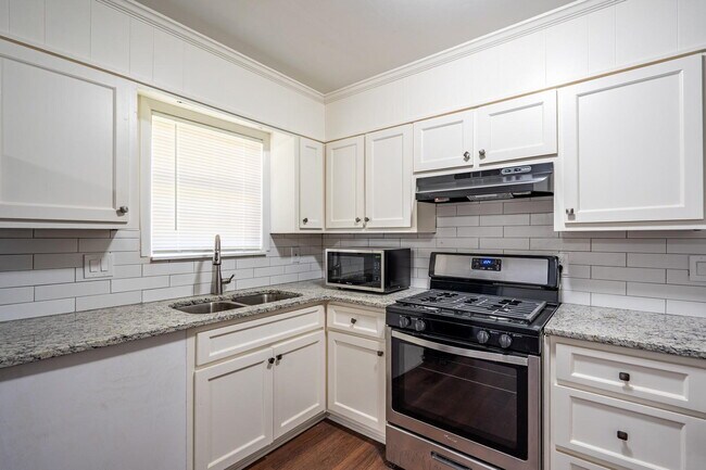 Building Photo - The Forest Haven | Large Forest Haven home with a spacious yard and deck, conveniently located ju...
