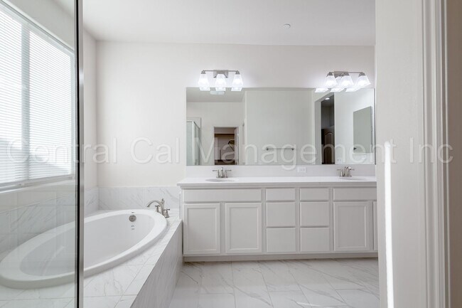 Building Photo - 4 Bedroom/3 Bath Home with Office and Paid Solar - $3395 Per Month!