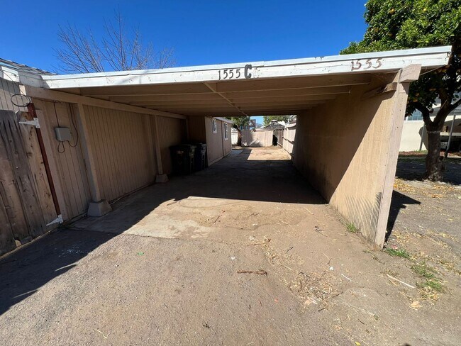 Building Photo - Private Detached House with Fenced Yard and Large Covered Carport