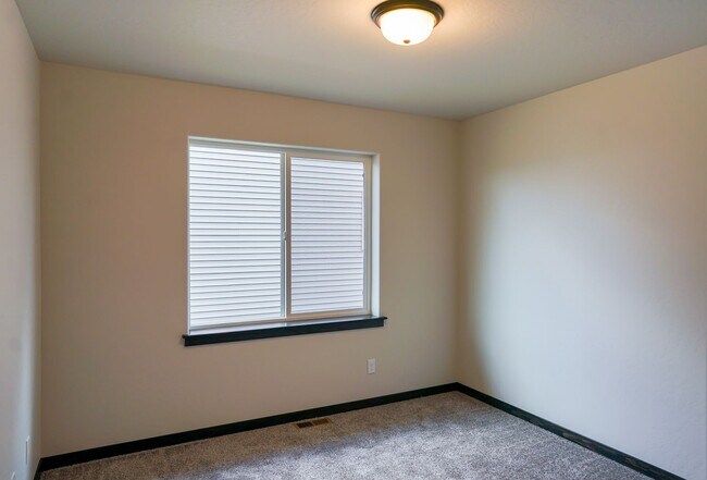 Building Photo - Newly built home with 3 car garage