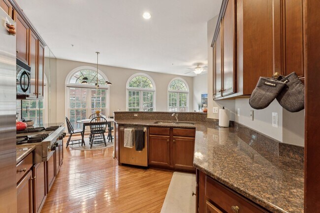 Building Photo - Discover this stunning four-level townhous...