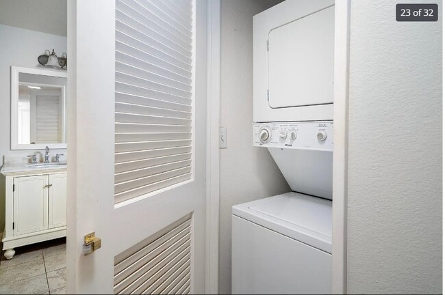 Never have to lug laundry up and down stairs. In-unit, stacked washer and dryer is tucked away in a - 24137 Del Monte Dr