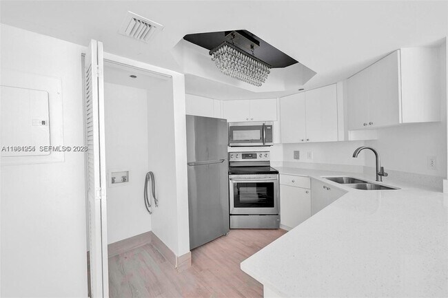 Building Photo - 8911 Collins Ave