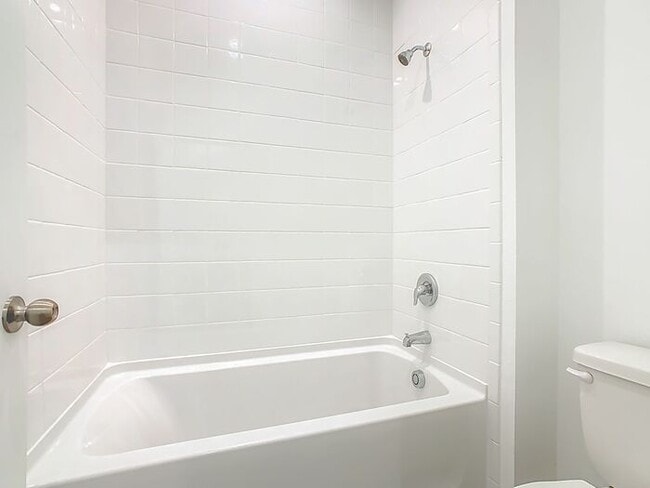 Building Photo - New Luxury Townhome in Celebration with All porcelain tiled floors. Island Village new construction