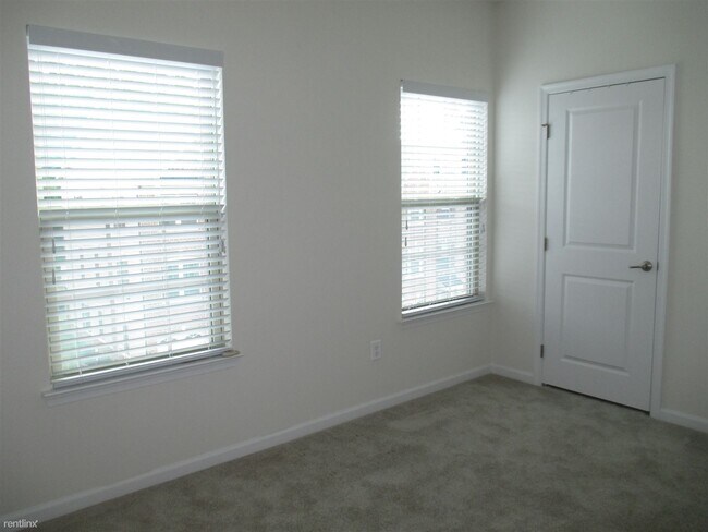 Building Photo - 2 br, 2.5 bath Townhome - 7731 Duncannon Ln