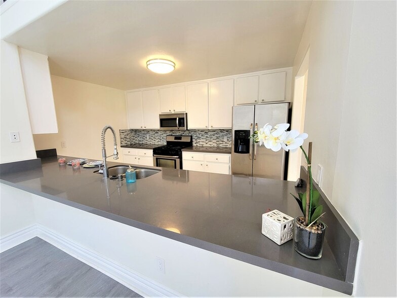 Building Photo - Bentley Luxury Investments LLC