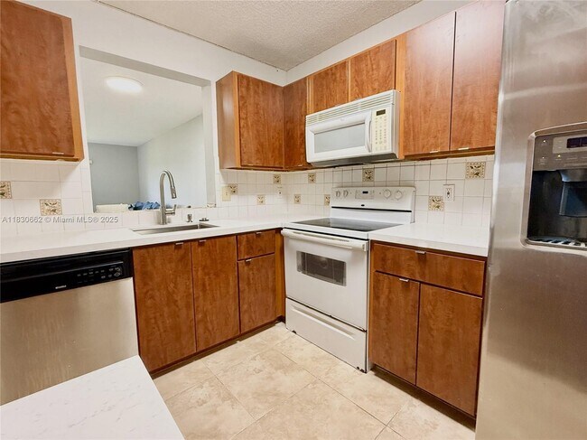 Building Photo - 8550 N Sherman Cir