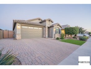 Building Photo - Presenting An Exquisitely Crafted 3/2.5 Goodyear Jewel Where Modern Sophistication Meets Serene Comf